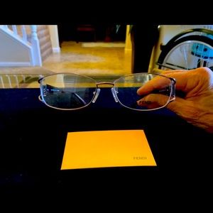 Fendi-new, color is deep wine. Jeweled temples. Size 55/15 metal/zyl combo